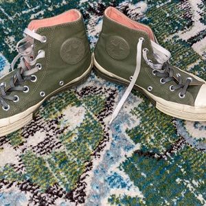 Navy green high top converse with peachy orange interior